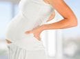Почему болит спина при беременности — основные причины